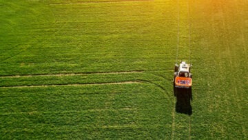 tractor makes fertilizer on the field. Top view